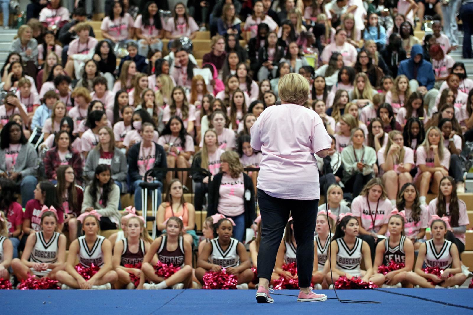Cy-Fair High School girls’ basketball coach Ann Robique speaks during the school’s annual Pink Out Rally.